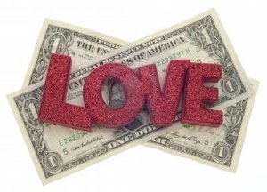 8683434-love-or-money-cost-of-love-concept-with-american-currency-isolated-on-white-with-a-clipping-path